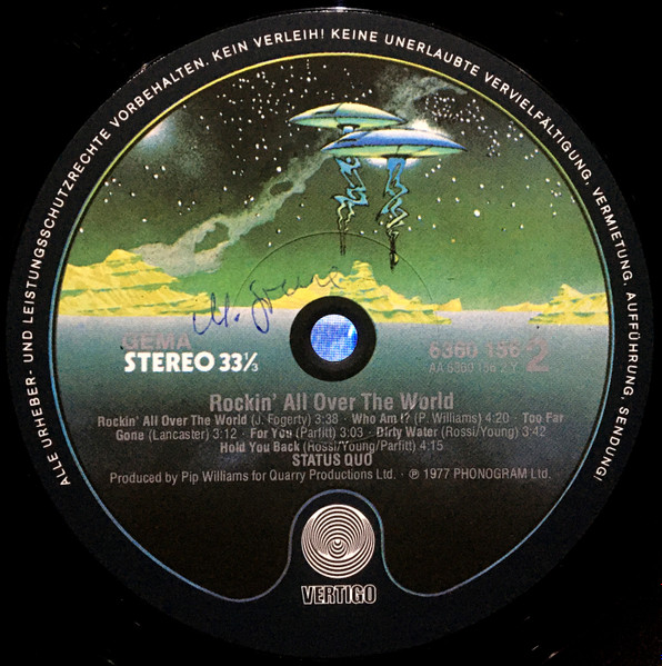 Status Quo - Rockin' All Over The World (LP, Album, Bla)